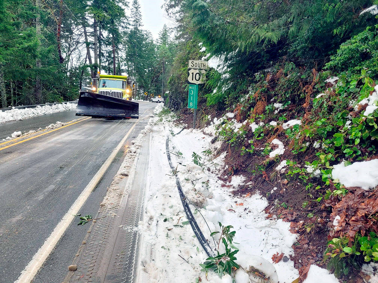 Here are some new photos of crews final clearing efforts to reopen US 101 to all traffic today.