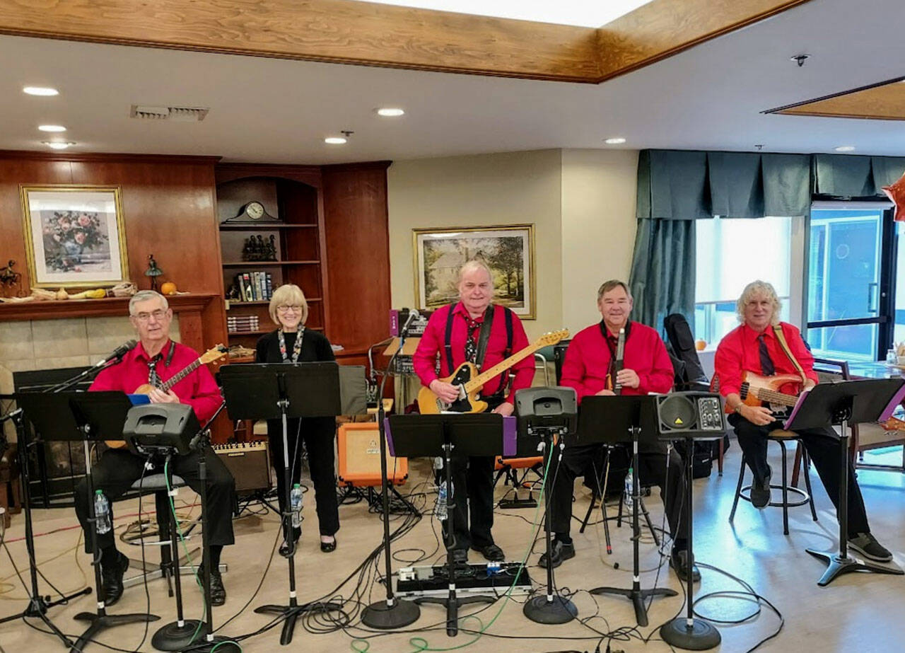 Buttercup Lane — which includes, from left, members Mike and Diane Johnson, Rodger Bigelow, Dave Keyte and Joe D’entrone — play at Olympic Theatre Arts Center on Jan. 7, part of the First Friday Art Walk Sequim for January. (Submitted photo)