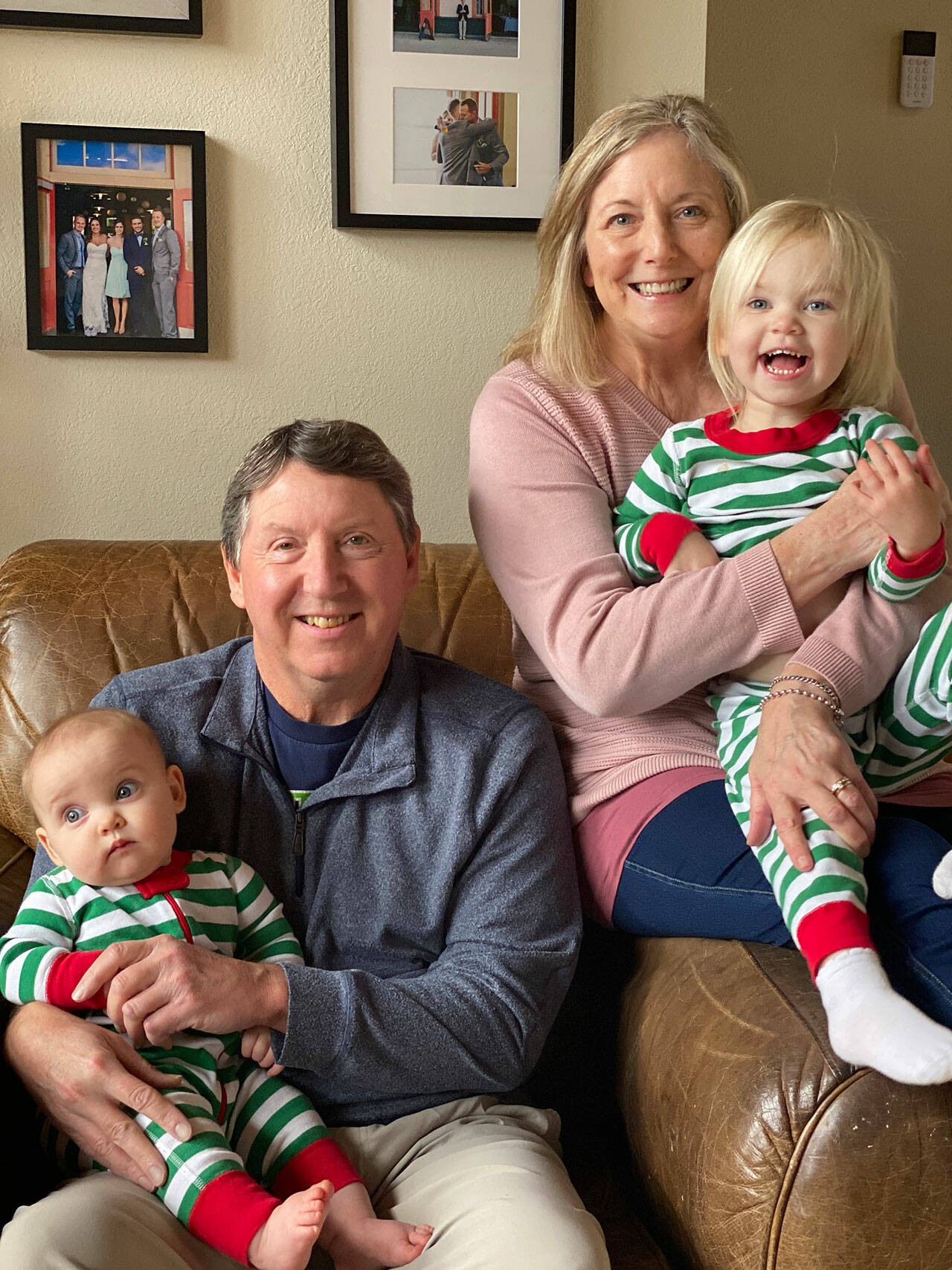 Mark Willis, pictured here in 2020 with Polly and granddaughters Hudson, left, and Bryn, is recuperating from a series of strokes suffered earlier this month. Photo courtesy of the Willis/Harrington family