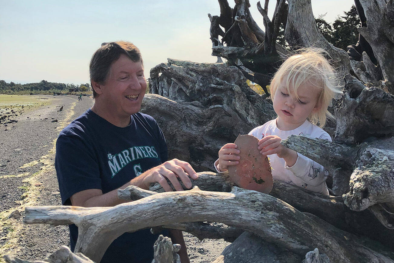 Mark Willis enjoys a day at the beach with granddaughter Bryn in 2020. (Willis/Harrington family)
