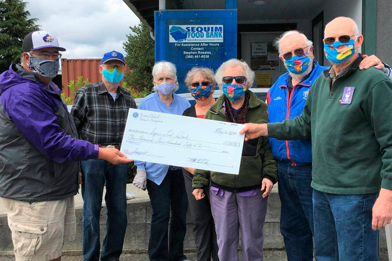 In May 2020, members of the Kiwanis Club of Sequim-Dungeness donated to the Sequim Food Bank at the beginning of the COVID-19 pandemic. Pictured, from left, are Stephen Rosales with the Food Bank, Wayne and Mary Boden, Philomena Lund, Janice Teeter, Richard Fleck and Ted Lund.