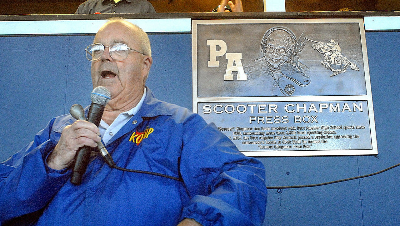 KONP Radio sportscaster Howard “Scooter” Chapman speaks to the crowd after the 2017 unveiling of a plaque naming the Civic Field press box the Scooter Chapman Press Box in recognition of his devotion to prep sports since the early 1950s. Chapman is retiring after a lifetime in broadcasting. (Keith Thorpe/Peninsula Daily News)