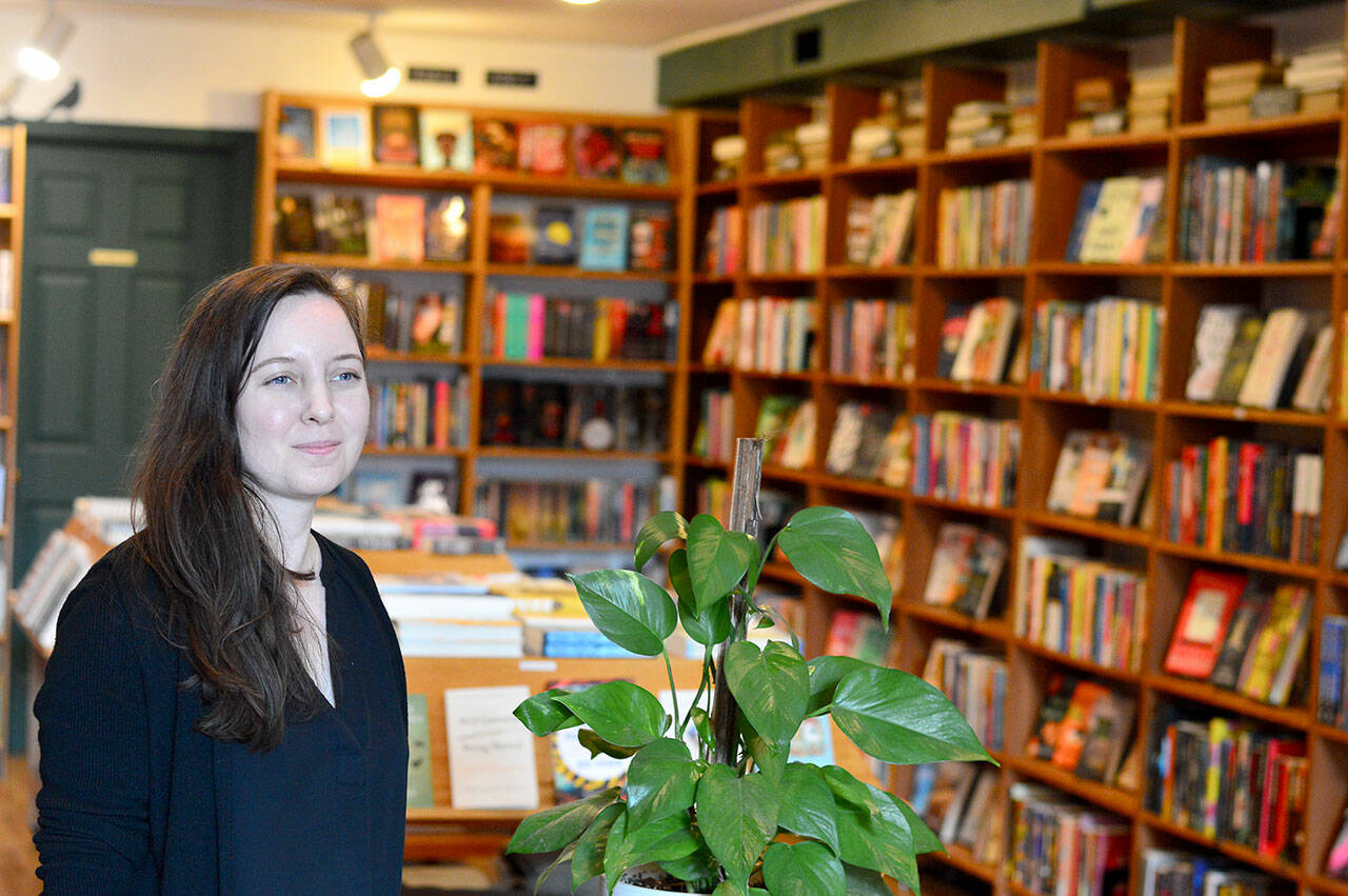 Lauren Davis, pictured at Port Townsend’s Imprint Bookstore, has just published her full-length poetry collection, “Home Beneath the Church.” (Diane Urbani de la Paz/Peninsula Daily News)