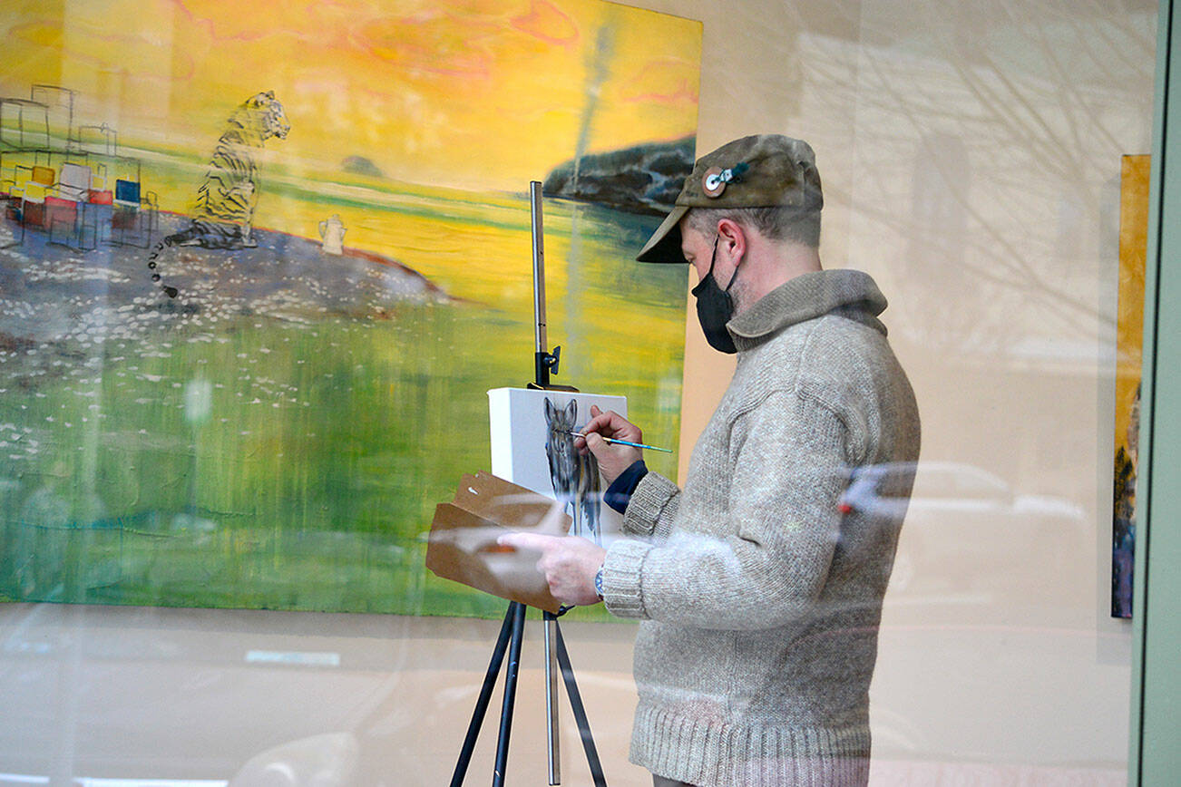 Todd Horton, who did a live painting event at Northwind Art’s Grover Gallery in January, will return for more live painting this Saturday and Sunday afternoon. Horton’s show, “The Mystic West,” is on display at the downtown Port Townsend gallery through March 14. (Diane Urbani de la Paz/Peninsula Daily News)