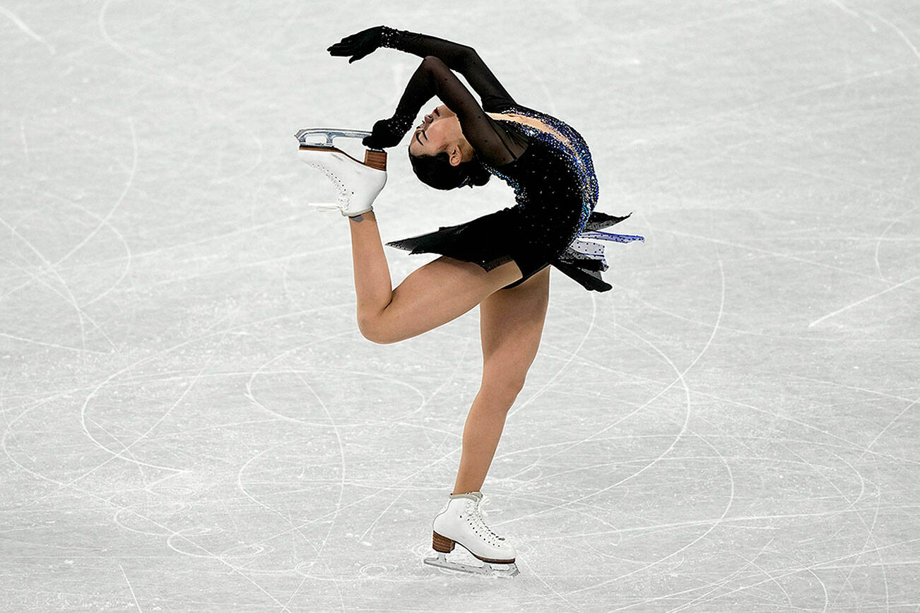 Karen Chen of the United States competes in the women’s short program team figure skating competition at the 2022 Winter Olympics on Sunday using music by Sequim composer Jennifer Thomas. (David J. Phillip/The Associated Press)