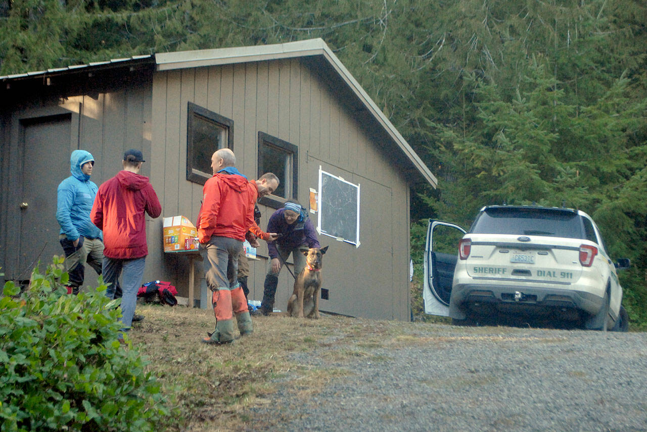 Search and rescue personnel stage at the home of Isaac Rivas in the 1600 block of Dan Kelly Road east of Port Angeles on Saturday, not far from where the 73-year-old man was located after going missing on Thursday. (Keith Thorpe/Peninsula Daily News)