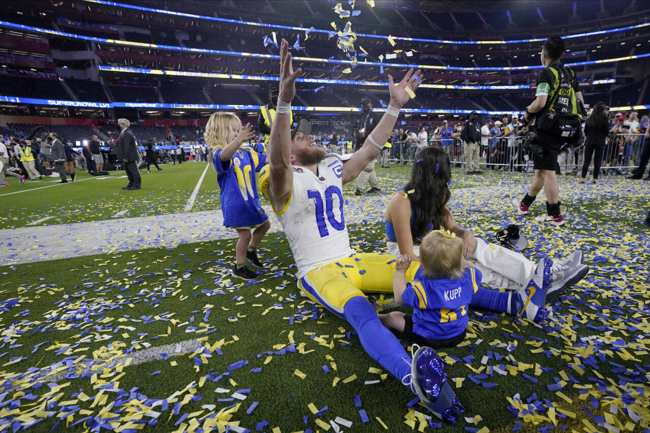 Los Angeles Rams wide receiver Cooper Kupp (10) celebrates with his family after the Rams defeated the Cincinnati Bengals in the NFL Super Bowl 56 football game Sunday, Feb. 13, 2022, in Inglewood, Calif. (AP Photo/Mark J. Terrill)