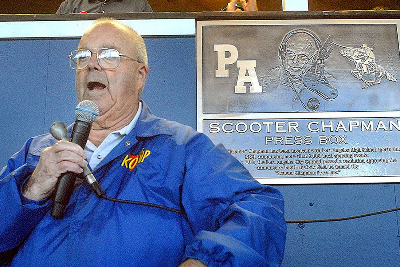 Keith Thorpe/Peninsula Daily News
KONP Radio sportscaster Howard "Scooter" Chapman speaks to the crowd after the unveiling of a plaque naming the press booth at Port Angeles Civic field the Scooter Chapman Press Box. Chapman was honored at the beginning of Friday evening's Port Angeles High School football game for his involvement with high school sports since the 1950s.