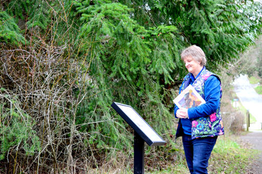 Jan Jacobson of the Port Townsend Library helped choose “Seya’s Song,” the current StoryWalk at Kah Tai Lagoon in Port Townsend. “Seya’s Song” is a book that contains S’Klallam words in its story about the people and wild creatures of the North Olympic Peninsula. (Diane Urbani de la Paz/Peninsula Daily News)