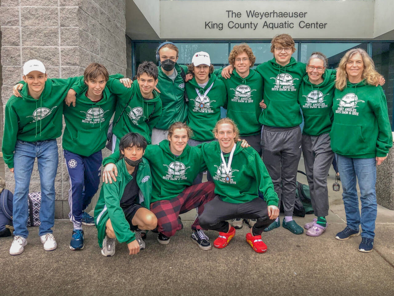 The Port Angeles boys swim team finished eighth in the state 2A meet held at the King County Aquatic Center in Federal Way this weekend. From left, back row, are Jacob Miller, Max Baeder, Blake Nahory, Aidan Butterworth, Landon Close, Colby Ellefson (Sequim), Adam Weller, head coach Sally Cole and assistant coach Lisa Walls. From left, front, are Alex Che, Adam Boyd and Josh Gavin. (Courtesy photo)