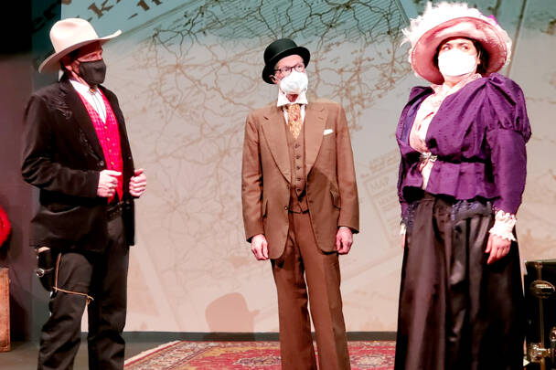 Projections of images are used in “Baskerville,” the Sherlock Holmes mystery opening tonight at the Port Angeles Community Playhouse. Among the players are Rick Mischke as Henry Baskerville, left, Peter Stone as Dr. Watson and Jessica Baskaran as Miss Beryl Stapleton. (Marissa Meek)