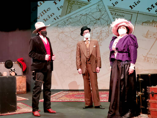 Projections of images are used in “Baskerville,” the Sherlock Holmes mystery opening tonight at the Port Angeles Community Playhouse. Among the players are Rick Mischke as Henry Baskerville, left, Peter Stone as Dr. Watson and Jessica Baskaran as Miss Beryl Stapleton. (Marissa Meek)