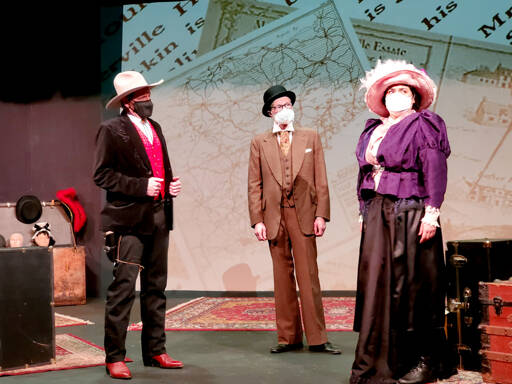 Projections of images are used in Baskerville, the Sherlock Holmes mystery opening tonight at the Port Angeles Community Playhouse. Among the players are Rick Mischke as Henry Baskerville, left, Peter Stone as Dr. Watson and Jessica Baskaran as Miss Beryl Stapleton. (Marissa Meek)