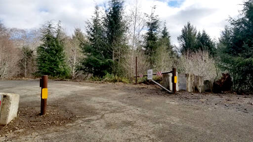 A gate, generally locked but open when this photograph was taken, was recently installed about 2 miles up A Road. (Christi Baron/Olympic Peninsula News Group)