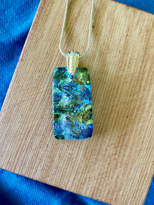 Mara Mauch, who creates multi-layered glass jewellery, is the Port Ludlow Art League Jeweler of the Month.
