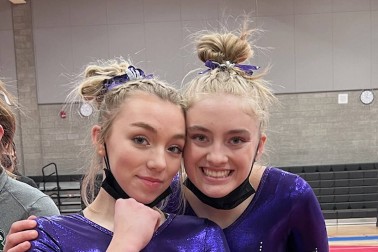 Sequim's Susannah Sharp, left, and Alex Schmadeke right, competed at the Washington 2A/3A gymnastics meet this weekend. Schmadeke finished 10th overall in the state and fifth in the floor. (Courtesy photo)
