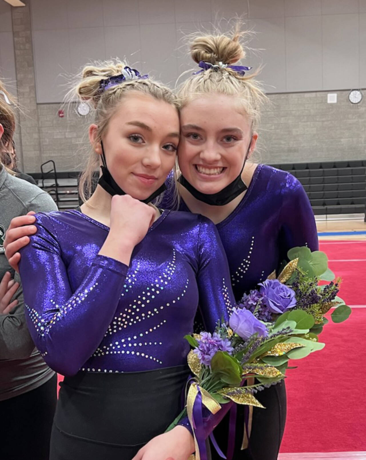 Sequim’s Susannah Sharp, left, and Alex Schmadeke right, competed at the Washington 2A/3A gymnastics meet this weekend. Schmadeke finished 10th overall in the state and fifth in the floor. (Courtesy photo)