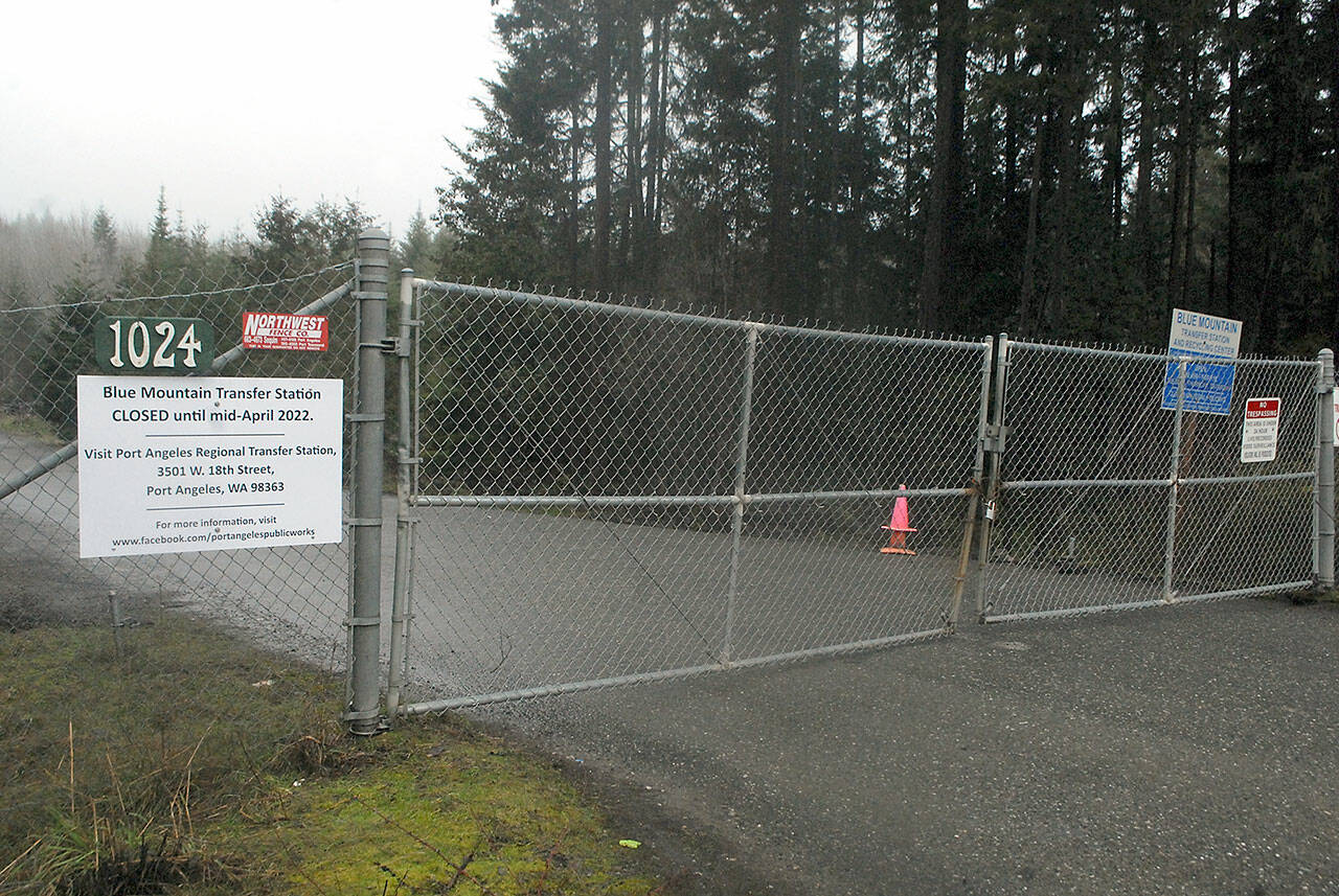 A locked gate guards the Blue Mountain Transfer Station on Blue Mountain Road east of Port Angeles on Tuesday. (Keith Thorpe/Peninsula Daily News)