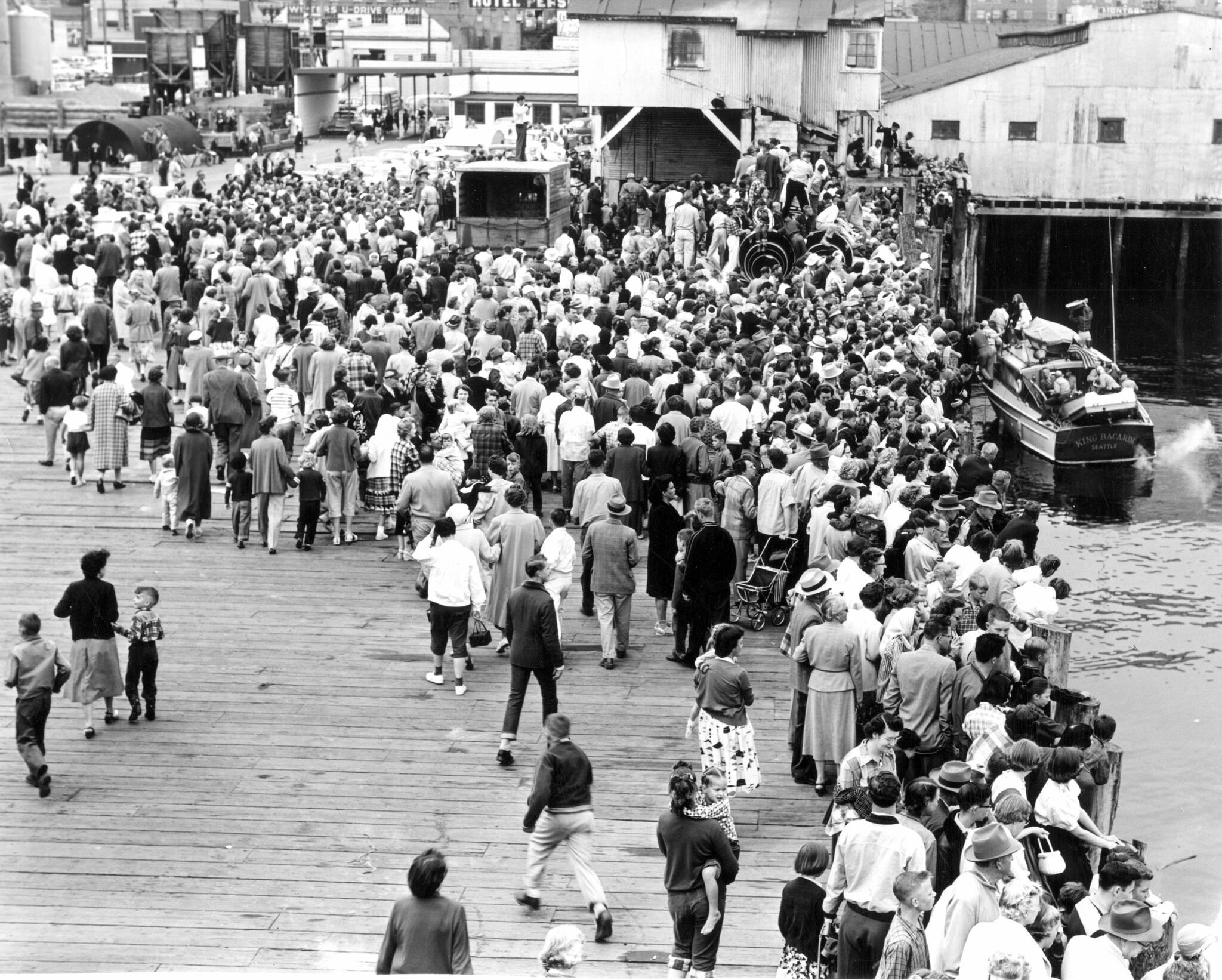 A large crowd greets long-distance swimmer Bert Thomas upon his return to Port Angeles. (Courtesy of North Olympic History Center)