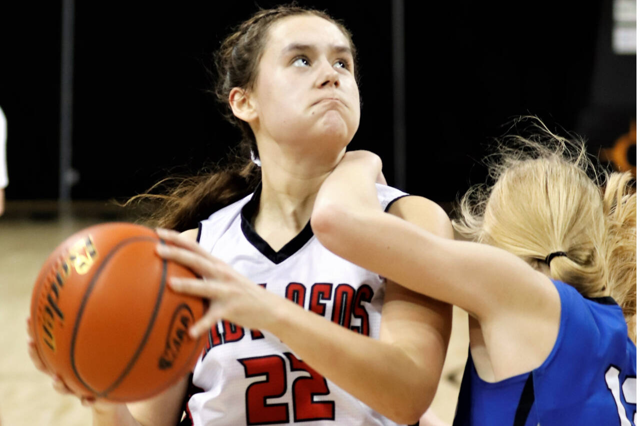 Neah Bay's Amber Swan drives to the basket Thursday against Wilbur-Creston-Keller in the 1B state quarterfinals. Swan scored 21 points in Neah Bay's 59-47 win. (Roger Harnack/Cheney Free Press)