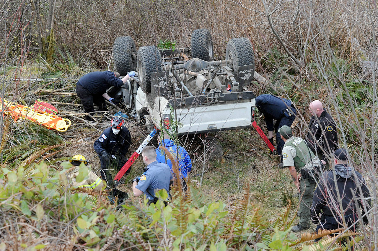 A Port Angeles man was airlifted from this wreck near Sappho. (Lonnie Archibald/for Peninsula Daily News)