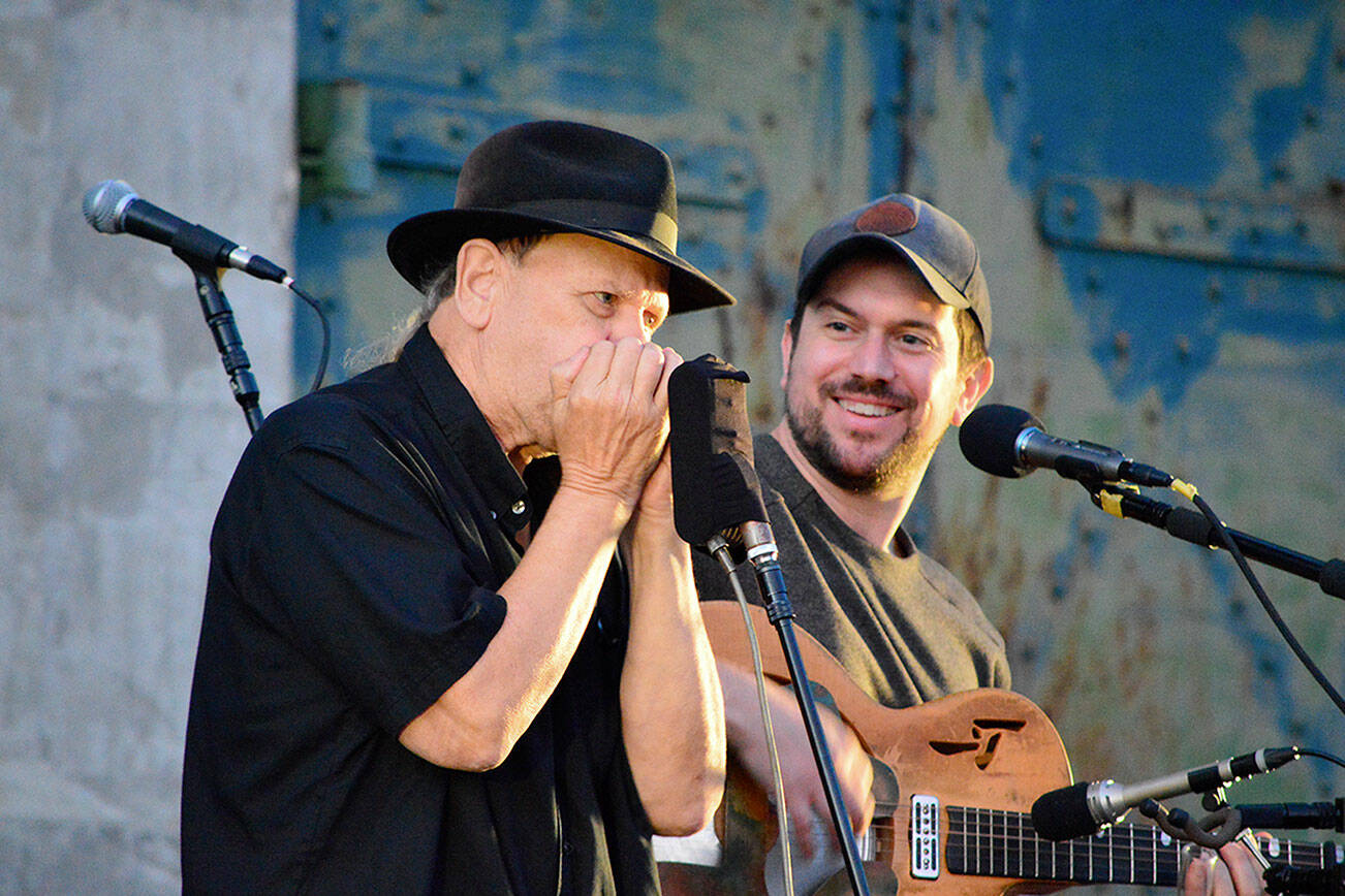 Bluesman David Jacobs-Strain, right, and harmonica player Bob Beach — along with dozens of other performers and bands —  will return to the Juan de Fuca Festival in Port Angeles this May. (Diane Urbani de la Paz/Peninsula Daily News)