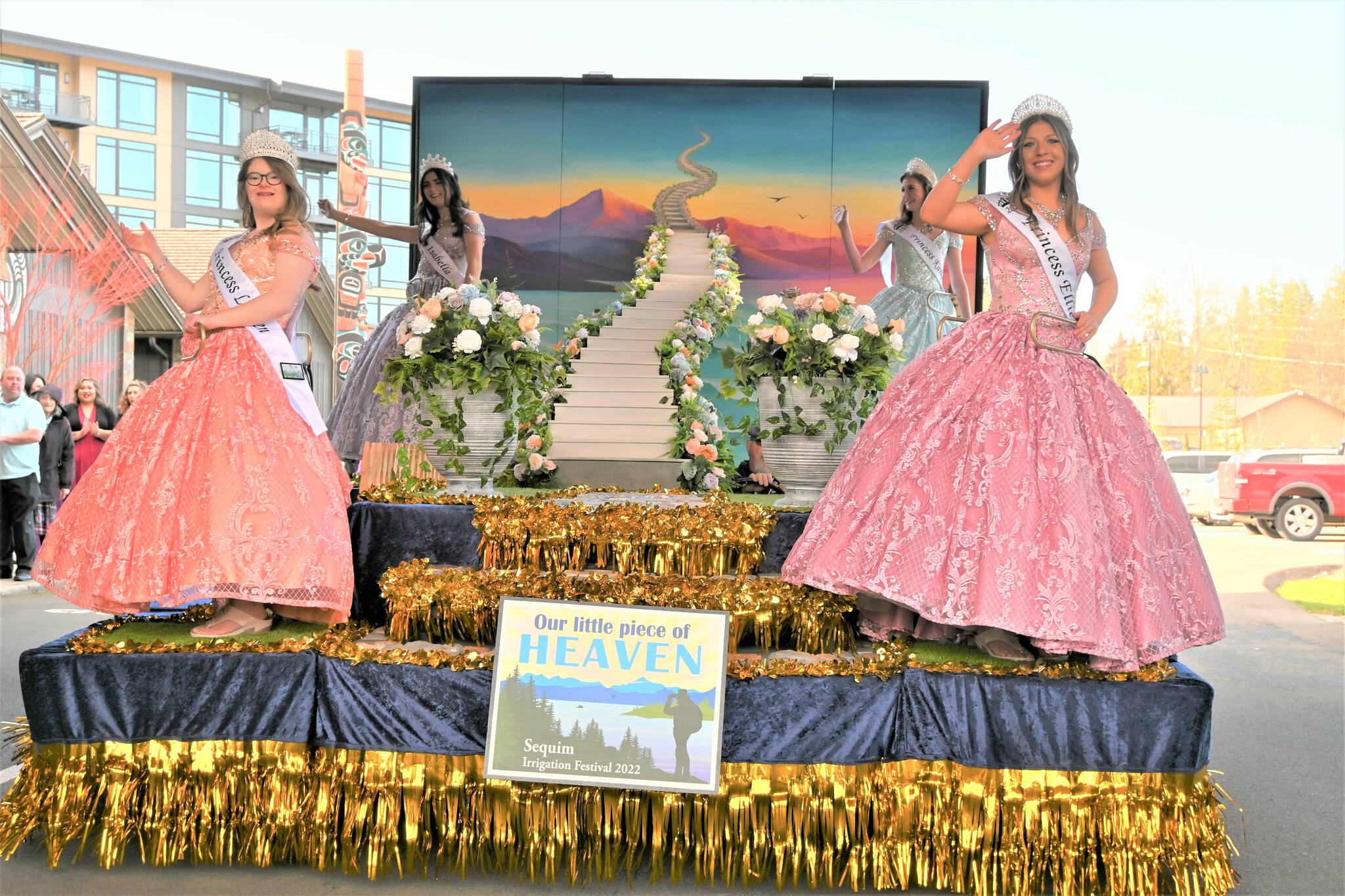 The 2022 Sequim Irrigation Festival royalty court boards the festival float at the 7 Cedars Resort on Saturday. From left are princesses Lauren Willis and Ellie Turner, queen Isabella Williams and Katherine Gould. (Michael Dashiell/Olympic Peninsula News Group)