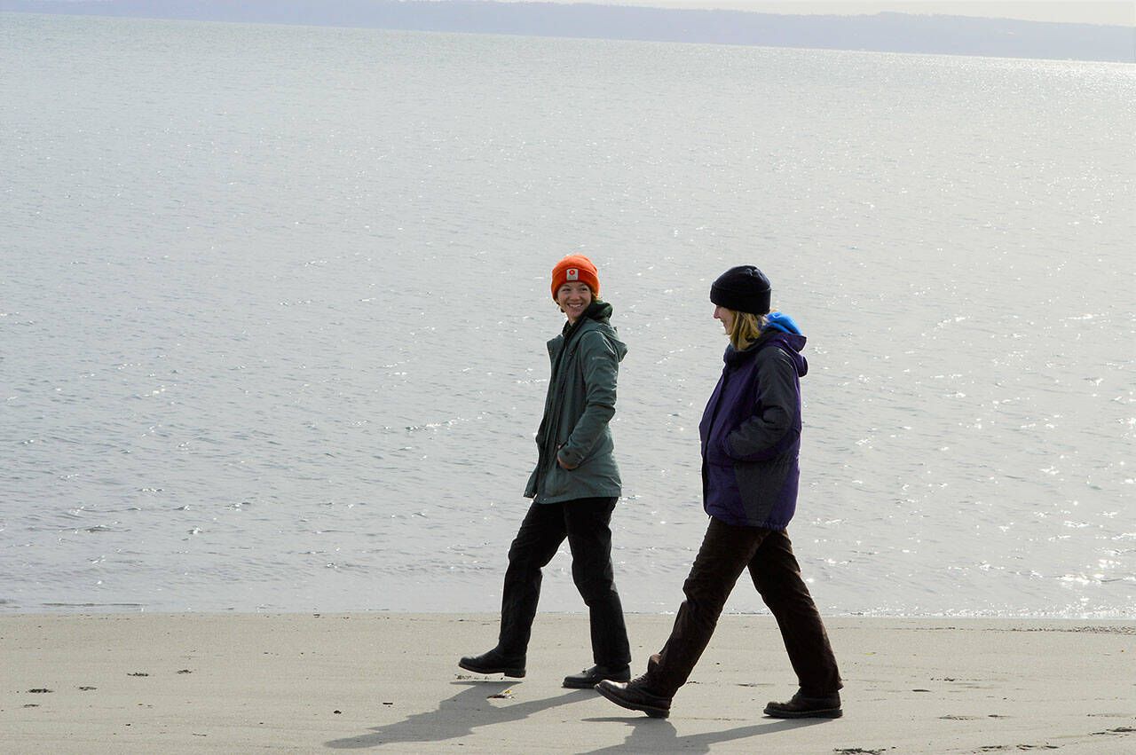 AmeriCorps service members Suzy Elbow, left, and Maggie Baker are debuting their springtime interpretive programs this Saturday at Fort Worden State Park. The pair will set up a Wind: Natures Biggest Fan exhibit near the beach in the morning and host an art-in-the-park activity beside a madrona tree in the afternoon. (Diane Urbani de la Paz/Peninsula Daily News)