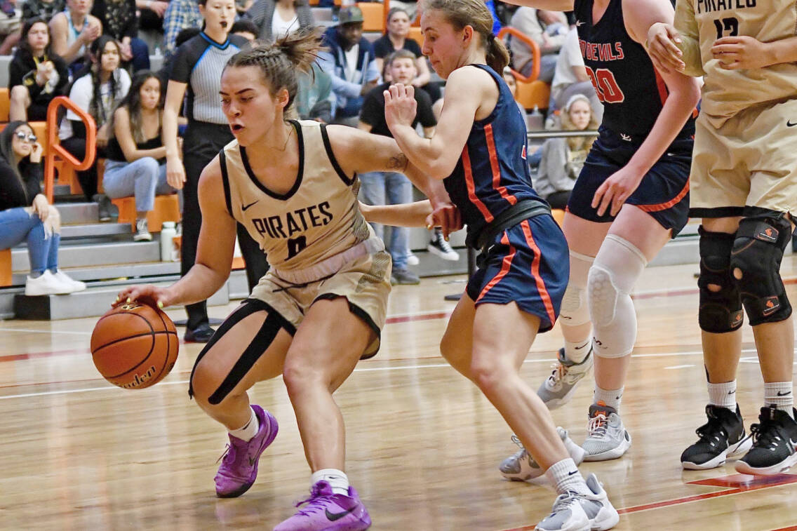 Jay Cline/Peninsula College Athletics
Peninsula College's Keeli-Jade Smith dribbles against Lower Columbia in the NWAC women's basketball championship game Sunday. Also in on the play at right is Peninsula's Itaua Tuisaula.