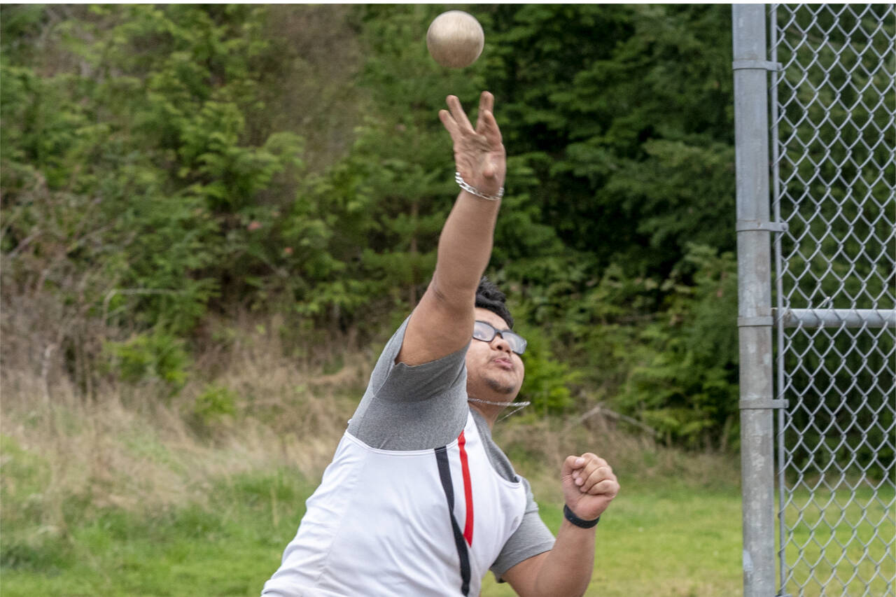 Steve Mullensky/for Peninsula Daily News
East Jefferson’s Anson Jones heaves the shot put 41 feet, 3 inches for second place in the shot put during a Nisqually League meet at Blue Heron Middle School on Tuesday.