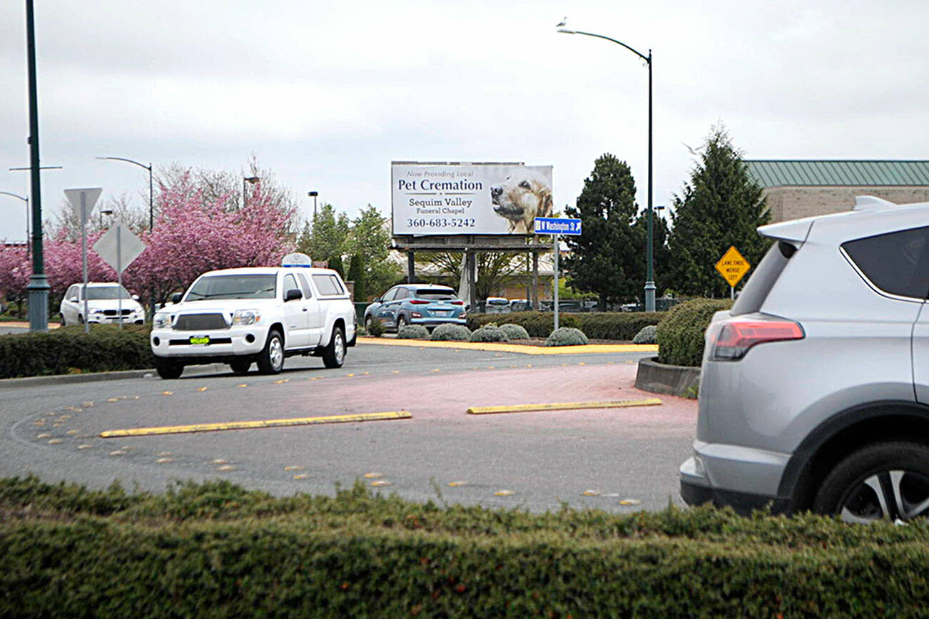 Construction crews will place a new overlay on West Washington Street in Sequim starting in late April from the River Road roundabout to the Ninth Avenue roundabout over about four weeks. (Matthew Nash/Olympic Peninsula News Group)