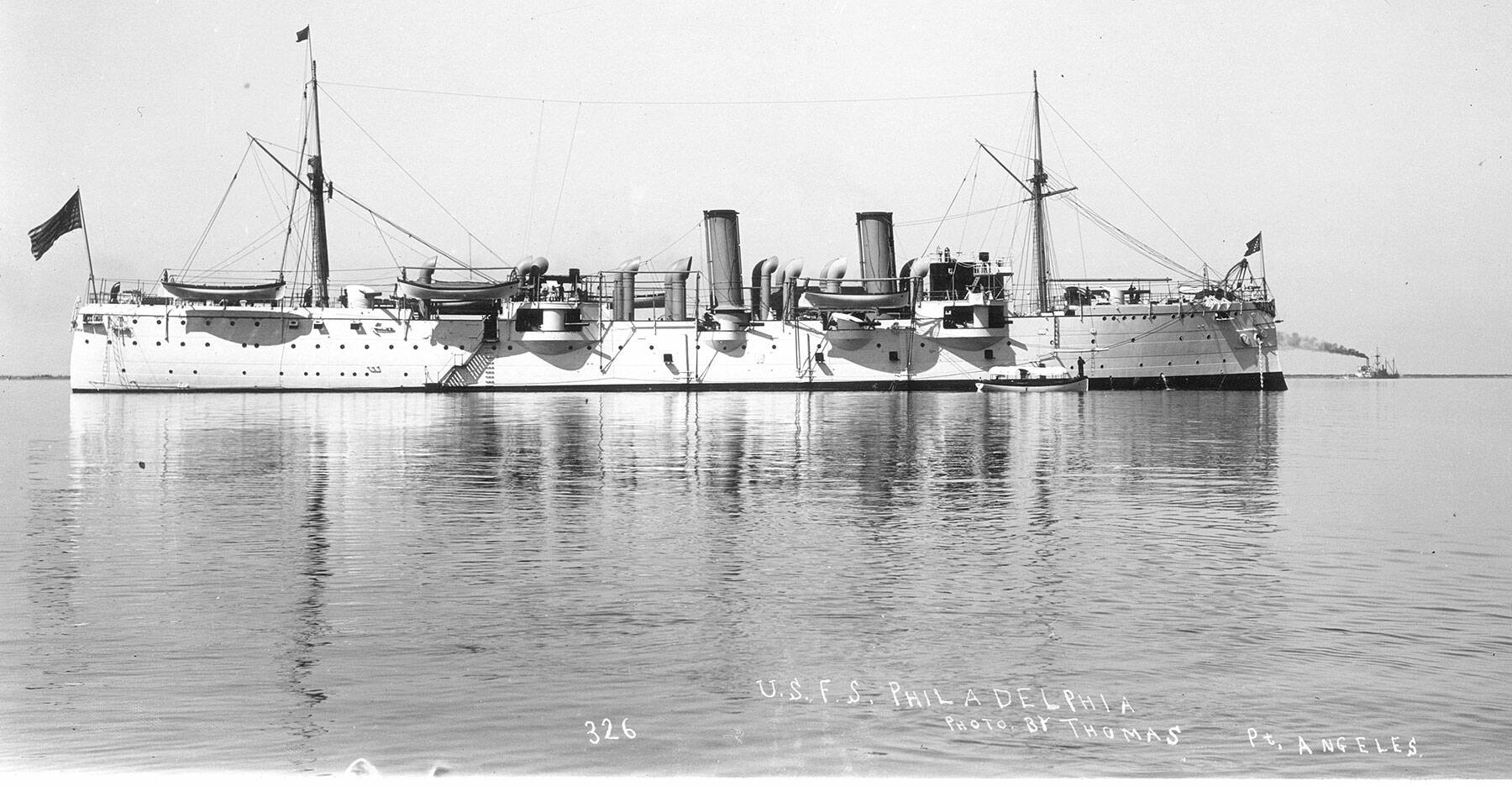 US Flag Ship Philadelphia in Port Angeles Harbor circa 1899. (Courtesy of the North Olympic History Center)