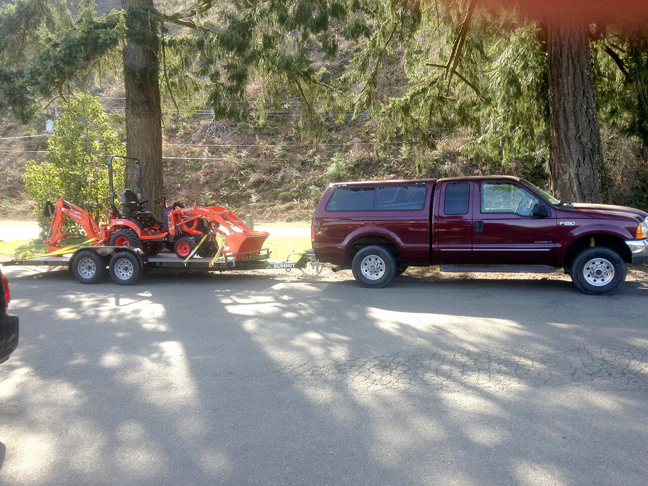 A truck, trailer and tractor were among items stolen from a Sekiu property. (Clallam County Sheriff’s Office)