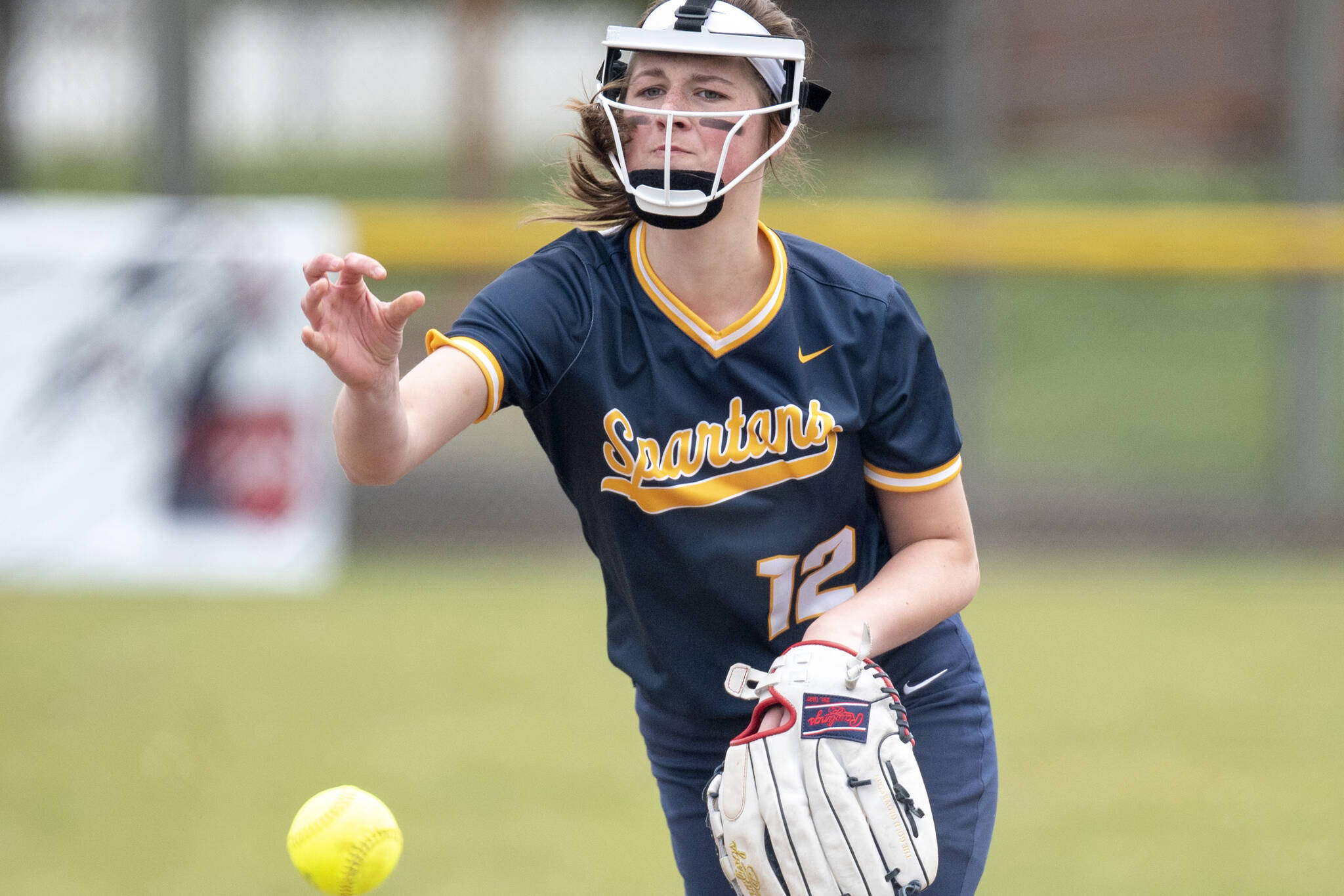Forks' Chloe Gaydeski-St. John delivers a pitch against Pe Ell/Willapa Valley on Friday in Pe Ell. The Spartans' three-game win streak was snapped in a doubleheader sweep by Pe Ell/Willapa Valley, the top team in the Pacific 2B League. (Eric Trent/The Chronicle)