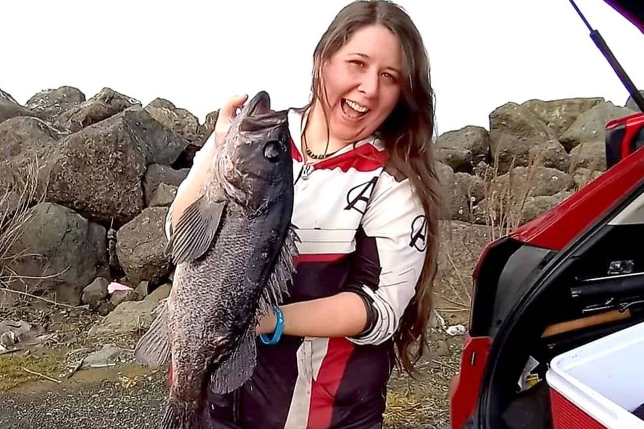 Britney Robinson found success, including this massive 24-inch black rockfish and a pair of lingcod while fishing the jetty at the Neah Bay marina recently.