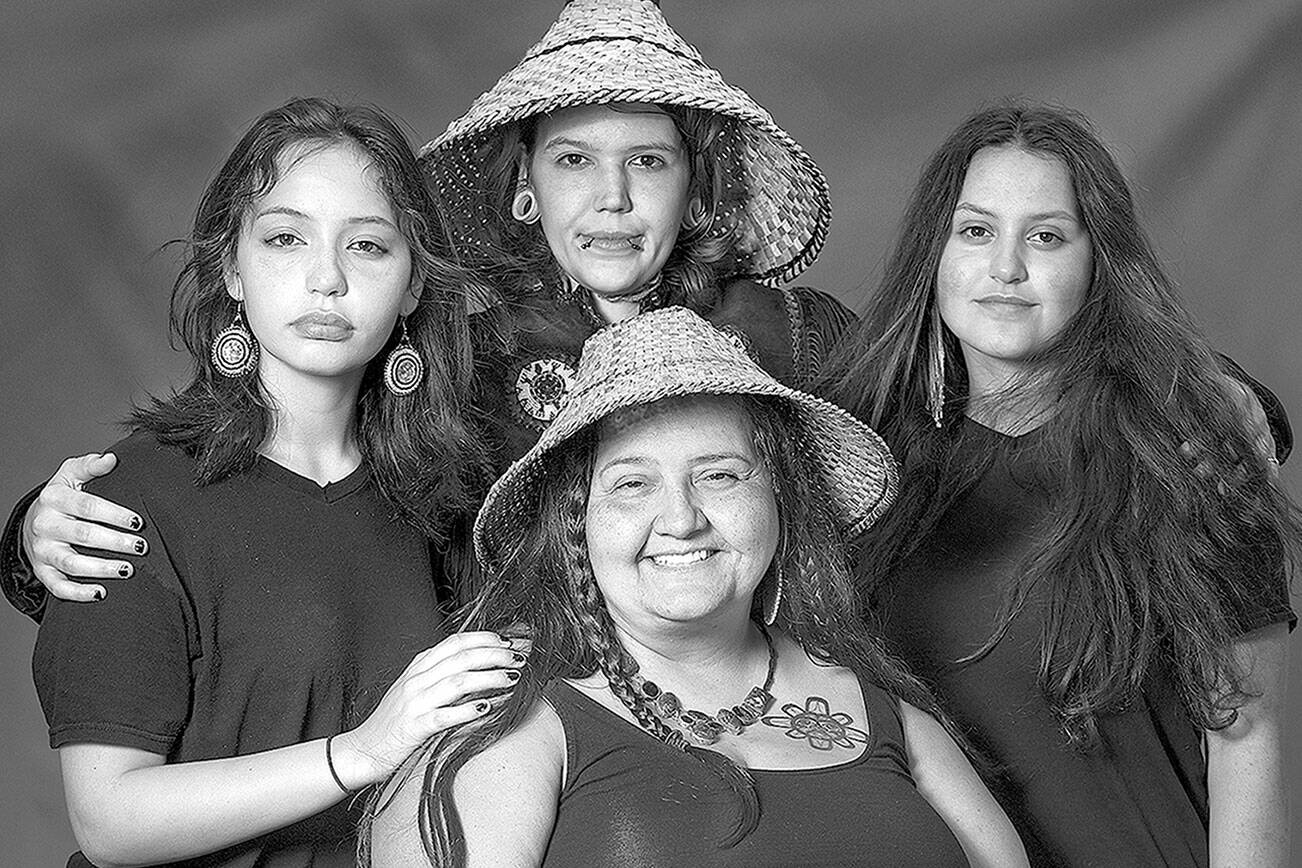 Clockwise from left are Eve, Tigerlily, Lea and Naiome Krienke, whose image is part of “Still Here: Portraits of the Chemakum,” a large-scale exhibit at Chimacum School. The public opening will be held Thursday afternoon. (Photo copyright Brian Goodman)