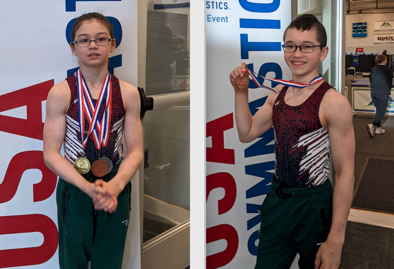 Liam DeWolf, left, and Connor DeWolf with Klahhane Gymnastics in Port Angeles show off their medals from the Region 2 Men’s Championships held last weekend in Pocatello, Idaho. (Courtesy photos)
