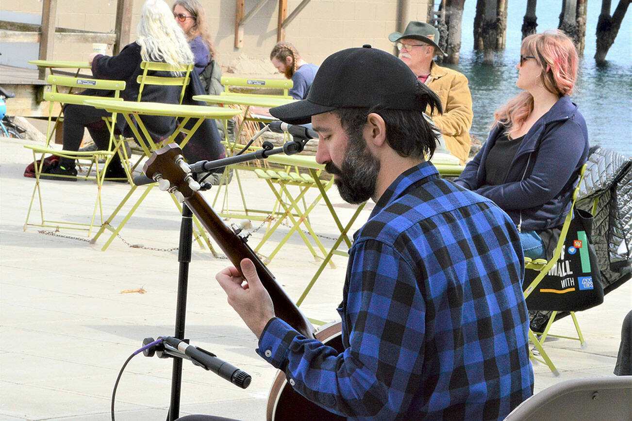 Jack Dwyer, pictured on Tyler Street Plaza in Port Townsend, will play at the Keg & I in Chimacum during the early evening this Saturday. Diane Urbani de la Paz/Peninsula Daily News