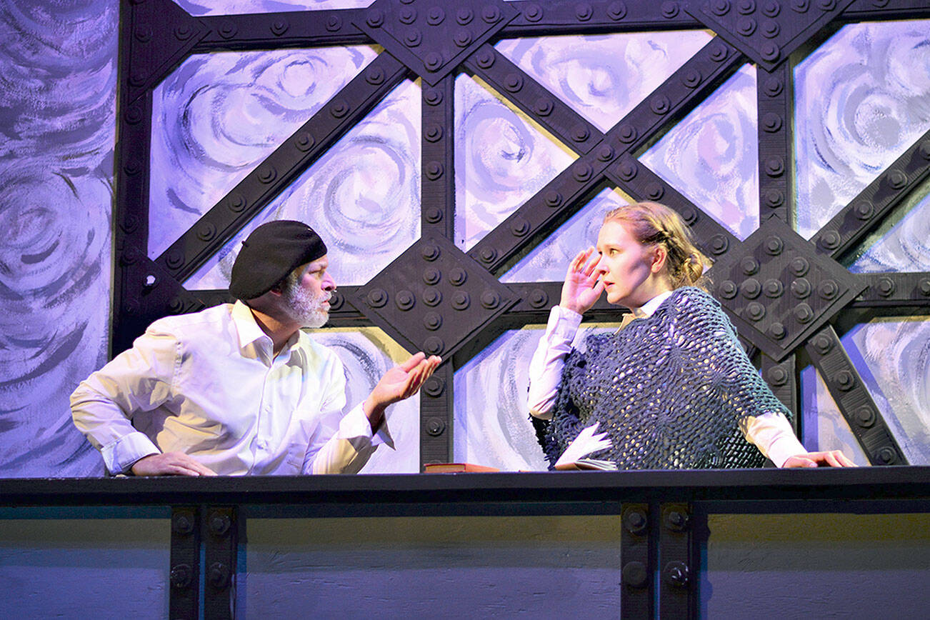 Novelist Jules Verne (David Natale) appears in the imagination of journalist-traveler Elizabeth Bisland (Maggie Jo Bulkley) in “Around the World in Less than 80 Days,” the play — penned by Natale — at Key City Public Theatre. (Diane Urbani de la Paz/Peninsula Daily News)