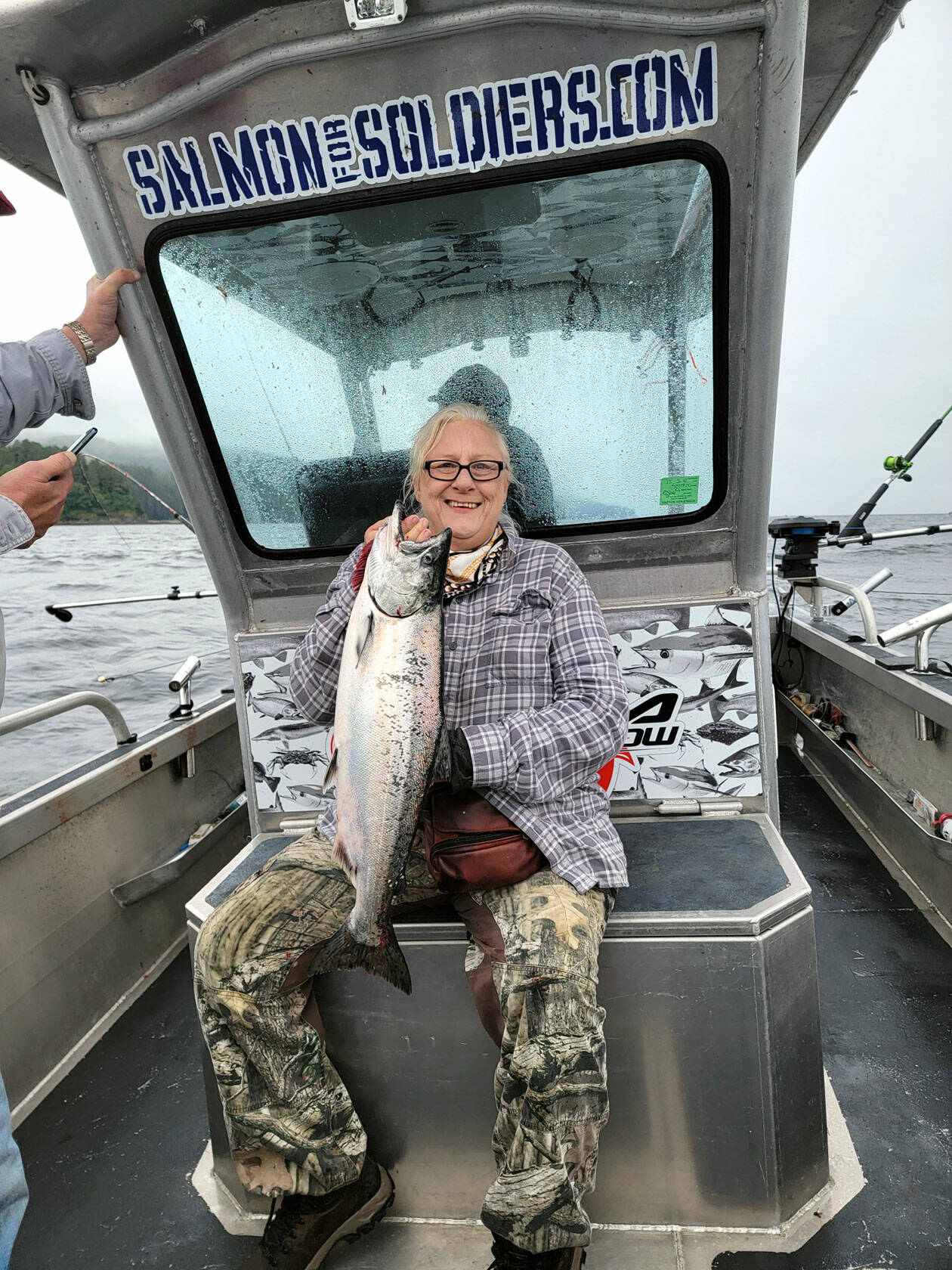 Lori Hester, a former Army nurse, limited on salmon during a summer of 2021 fishing trip with the Olympic Peninsula chapter of Salmon for Soliders. (Courtesy photo)