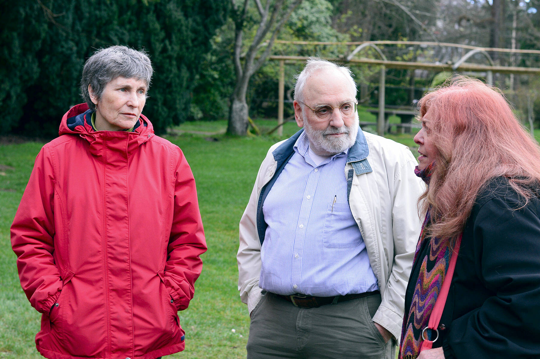 Jean Walat, left, Larry Jensen and Ruth Asare are members of Jefferson County Immigrant Rights Advocates, which has established a sponsor circle to help three Afghan refugees resettle in Port Townsend. (Diane Urbani de la Paz/Peninsula Daily News)