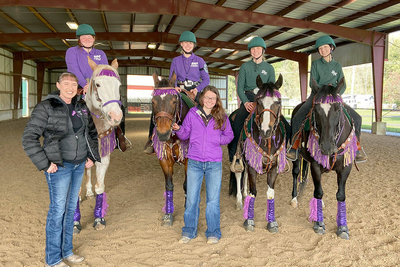 Submitted photo

Sequim and PA’s high school equestrian teams merged to compete as one in Freestyle 4’s Drill Team, placing 1st  in meet 3 and winning a gold medal are Joanna Seelye, left, Libby Swanberg, Maggie Anderson and Sydney Hutton with coaches Katie Newton, left, and Keri Tucker. Watch them  compete live at state finals May 19-22  by visiting https://www.wahset.info/stream-links and clicking on District 4.