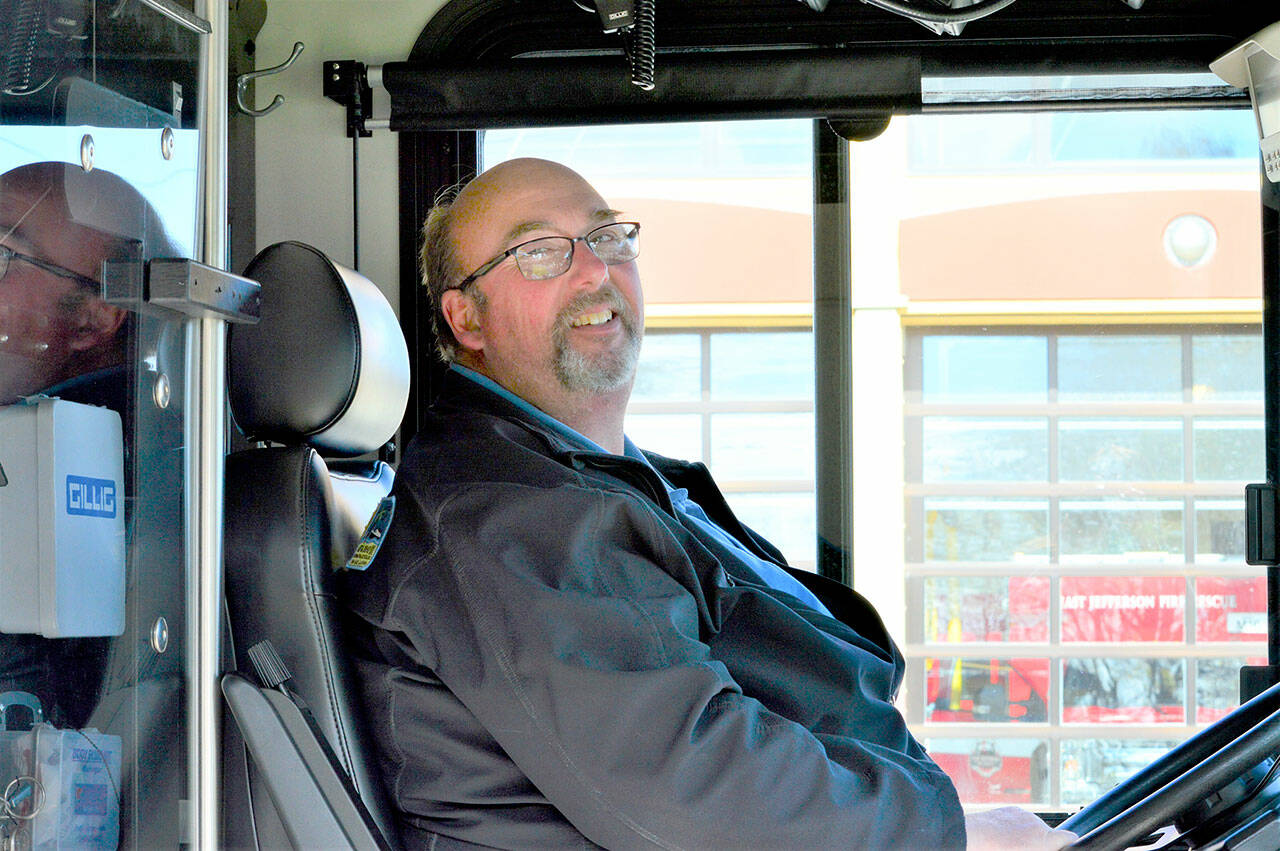 Jefferson Transit bus driver Lloyd Eisenman worked without a mask on his Port Townsend shuttle route Tuesday. (Diane Urbani de la Paz/Peninsula Daily News)