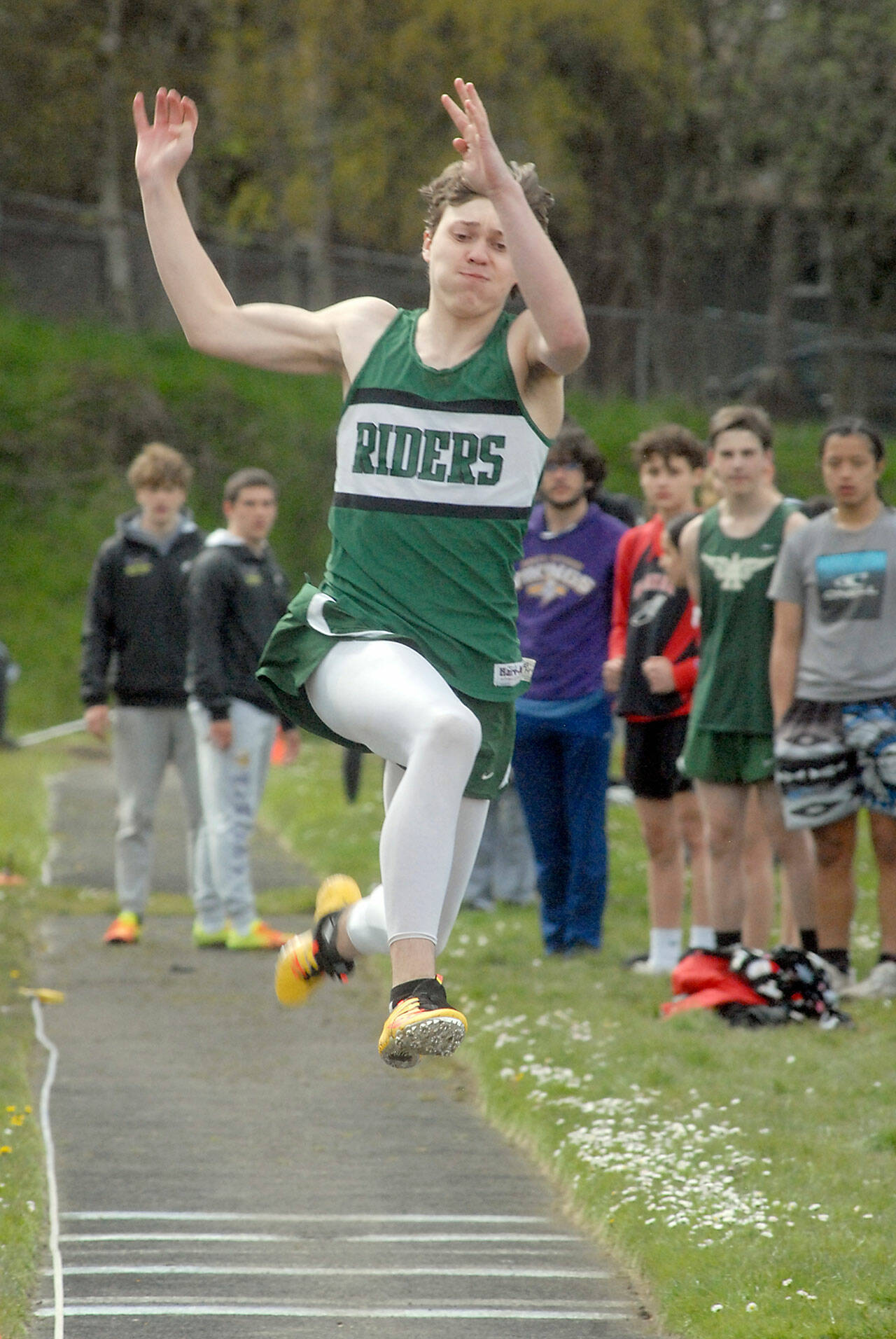Keith Thorpe/Peninsula Daily News Port Angeles’ Parker Nickerson competes in the boys long jump on Thursday at Port Angeles High School.