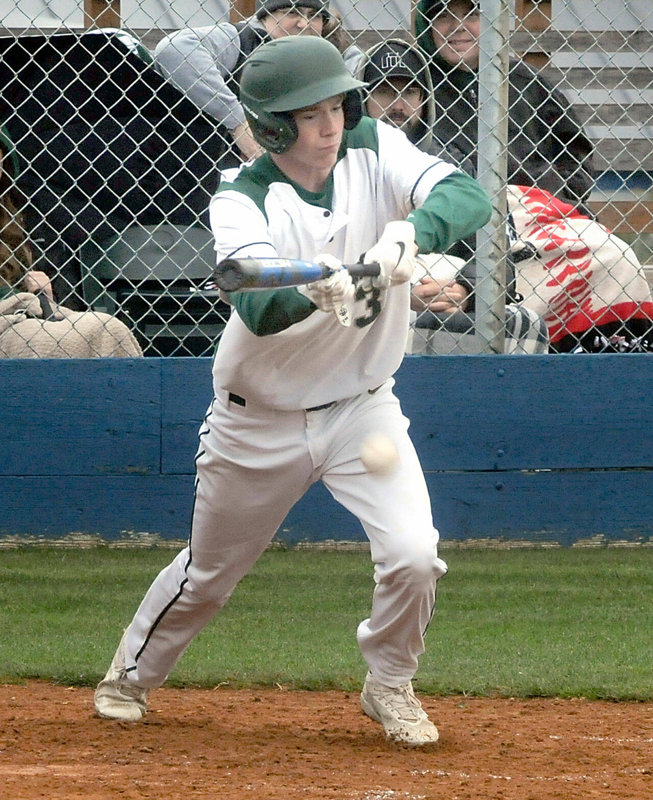 Keith Thorpe/Peninsula Daily News Port Angeles’ Michael Soule attempts to bunt in the third inning against North Kitsap on Wednesday in Port Angeles.