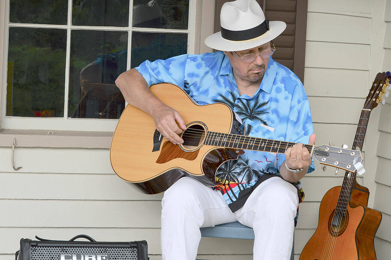 Chicago Bob Longmire, pictured playing solo at the Rothschild House last summer, will bring the Midnight Train Blues Band to Port Townsend’s Discovery Bay Brewing Co. for the monthly blues jam starting Sunday. (Diane Urbani de la Paz/Peninsula Daily News)