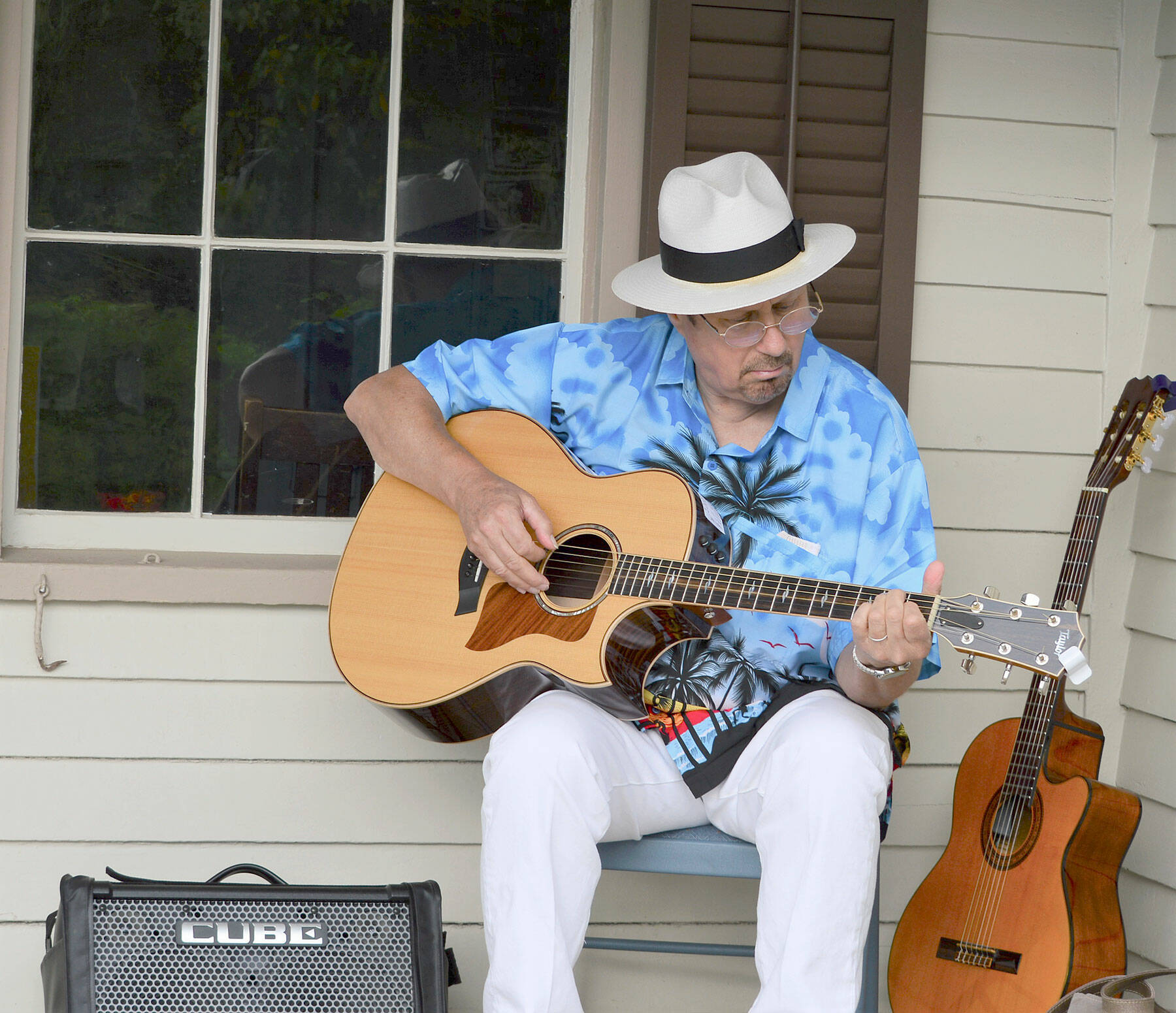 Chicago Bob Longmire, pictured playing solo at the Rothschild House last summer, will bring the Midnight Train Blues Band to Port Townsends Discovery Bay Brewing Co. for the monthly blues jam starting Sunday. (Diane Urbani de la Paz/Peninsula Daily News)