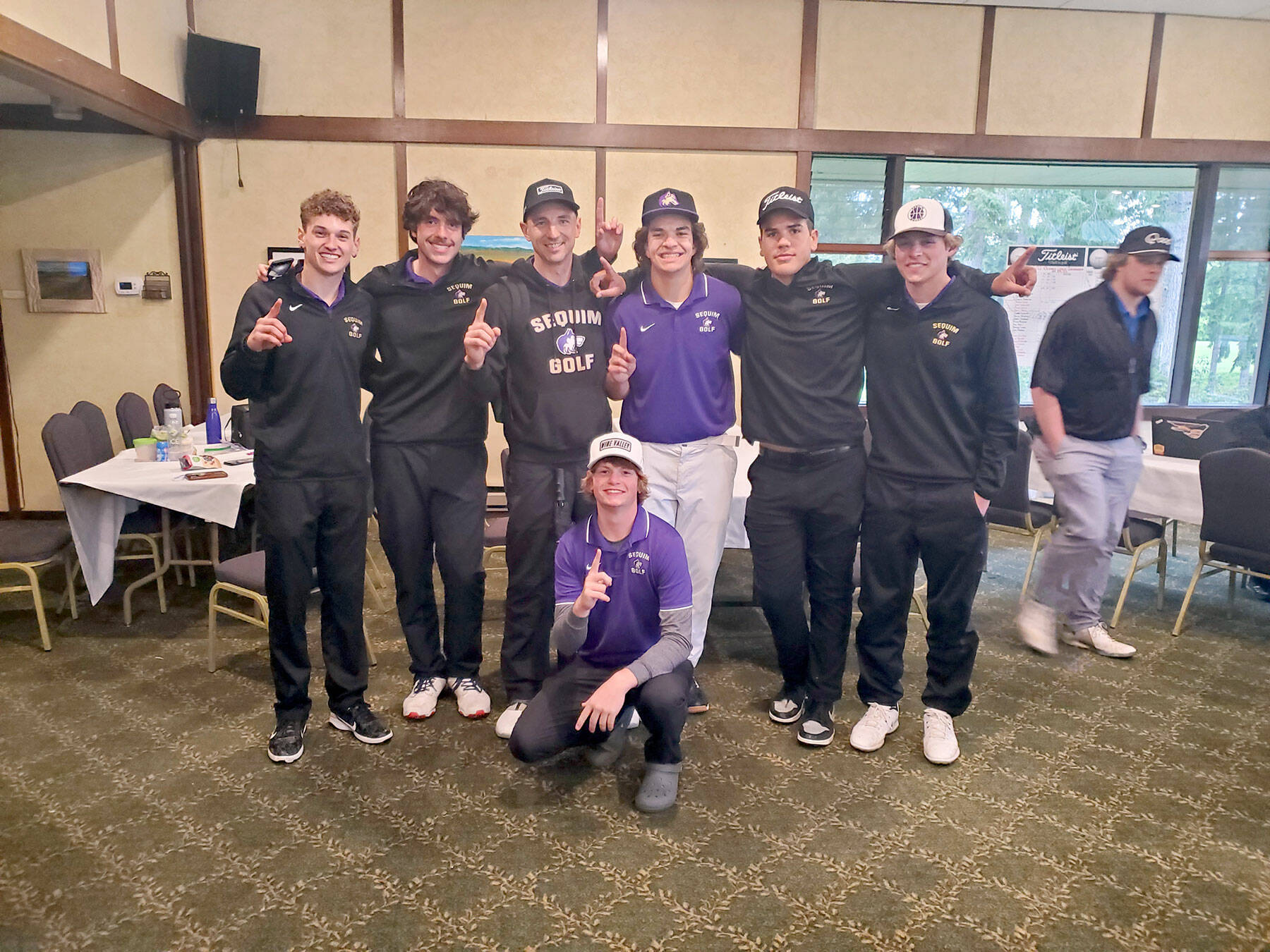 The Sequim boys golf team earned a 19-stroke victory in the Olympic League Boys Golf Championships held Monday at Kitsap Golf & Country Club. Sequim’s Ben Sweet (kneeling) won the individual league title by one stroke over teammate Dominic Riccobene, far left. The Wolves also finished the Olympic League regular season with an undefeated record. Team members are, from left, Riccobene, Cole Smithson, Coach Sean O’Mera, Lars Wiker, Pryce Glasser, Zackary Thompson and Sweet.