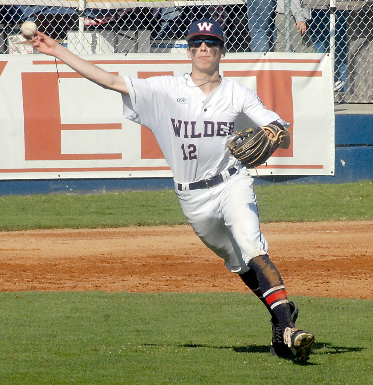 Wilder Senior third baseman Landon Siebel makes a throw to first during a 2021 contest at Civic Field. Tryouts for the American Legion baseball program will be held later this month. (Keith Thorpe/Peninsula Daily News)