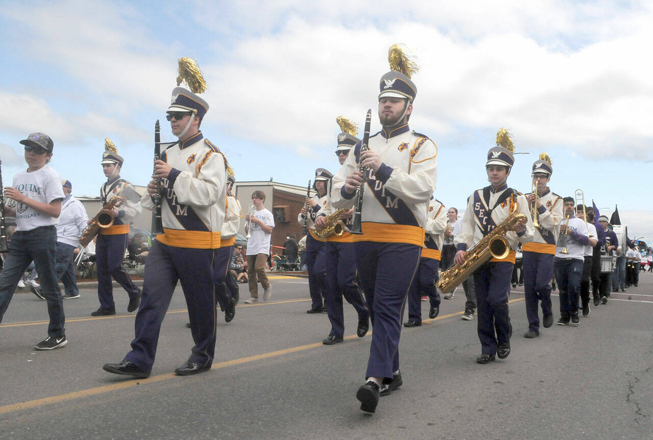 A combined Sequim Middle School and Sequim High School marching band takes part in Saturday’s Sequim Irrigation Festival Grand Parade. (Keith Thorpe/Peninsula Daily News)
